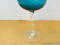 Elegant turquoise wine glass with twisted stem and textured bowl, perfect for any occasion.