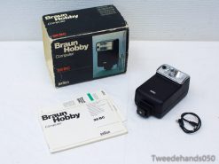 Vintage Braun Hobby 28 BC flash unit with original box and manual for photography enthusiasts.