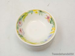 Elegant porcelain bowl with pastel floral design, ideal for sauces, dips, or decorative use.