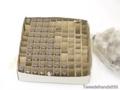 Organized vintage glass bulbs in a protective box, perfect for collectors and enthusiasts.