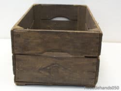 Rustic wooden crate for vintage storage and decor in farmhouse and country styles.