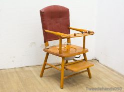 Charming vintage high chair with burgundy cushion and bead-topped tray for toddlers.