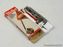 Vintage Weller soldering kit for DIY projects and electronics repairs, designed for comfort and precision.