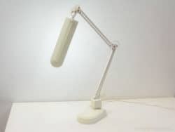 Sleek white adjustable desk lamp with modern design for stylish, functional workspaces.