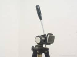 Vintage camera tripod head for stability and precise adjustments in photography and videography.