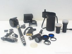 Vintage photography tools and accessories for creative professionals, including lenses, filters, and portable equipment.