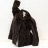 Luxurious vintage dark brown faux fur coat for stylish warmth on cold winter days.