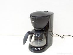 Sleek black Braun coffee maker with glass carafe, perfect for modern kitchens and coffee lovers.