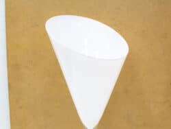 Elegant white funnel for precise pouring and modern kitchen décor.