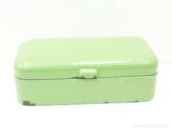 Charming vintage green storage box with wear, perfect for decor and keepsakes.