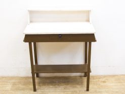 Stylish wooden desk with light top, dark legs, drawer, and open shelf for organization.