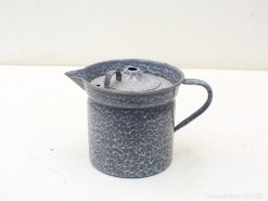 Vintage gray pitcher with marbled finish, ideal for serving drinks or adding decor.