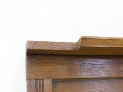 Elegant vintage wooden coat rack showcasing rich grain and exquisite handcrafted details.