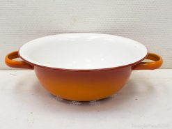 Vibrant orange ceramic bowl with glossy white interior and handles for stylish serving and mixing.