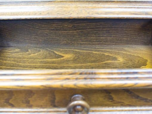 Elegant vintage wooden drawer with striking grain, perfect for stylish storage and decor.