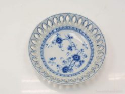 Elegant blue floral porcelain plate with scalloped edge, perfect for decorative displays and occasions.