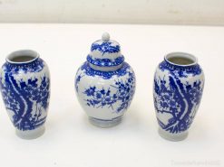 Elegant blue and white porcelain trio with floral designs for refined home decor.