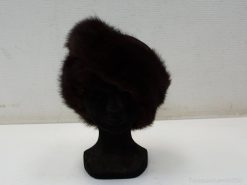 Chic dark brown fur hat for stylish winter looks and cozy warmth.