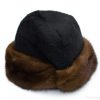 Elegant black and chocolate brown fur hat for stylish warmth in winter.