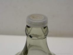 Sleek glass bottle with white cap, ideal for beverages and contemporary home styling.