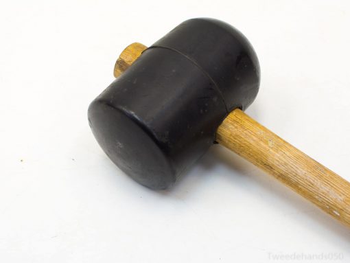 Durable rubber mallet with wooden handle, ideal for woodworking and delicate precision tasks.