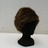 Luxurious deep brown vintage fur hat, a timeless accessory for elegant fashion lovers.