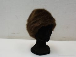 Luxurious deep brown vintage fur hat, a timeless accessory for elegant fashion lovers.