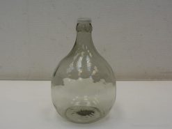 Elegant vintage glass bottle with a timeless design, ideal for storage and decorative accents.