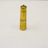 Vintage gold cylindrical container with textured finish, perfect for spices or decorative display.