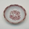 Elegant vintage porcelain dish with floral transferware design, perfect for display or dining.