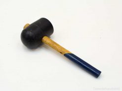 Vintage rubber mallet with a sturdy wooden handle, ideal for delicate precision tasks.