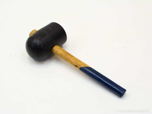 Vintage rubber mallet with a sturdy wooden handle, ideal for delicate precision tasks.