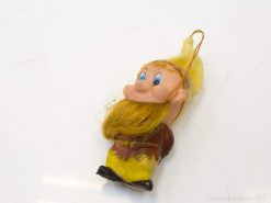 Cheerful gnome keychain with yellow hat and beard, perfect for whimsical decor and collections.