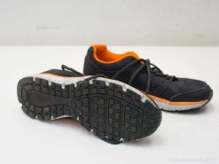 Stylish black and orange athletic shoes with breathable mesh and durable soles for active lifestyles.