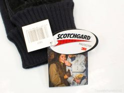 Cozy black knitted gloves with Scotchgard for warmth and water resistance in winter weather.