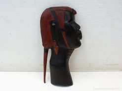 Stylish wooden head sculpture showcasing cultural significance and intricate craftsmanship.