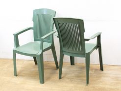 Stylish green plastic chairs ideal for versatile indoor and outdoor settings.