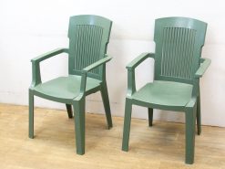 Stylish green plastic chairs for comfortable indoor and outdoor seating.