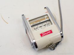 Stylish vintage Sixon light meter for accurate photography and filmmaking exposure measurements.