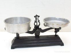 Classic antique balance scale with aluminum bowls, ideal for vintage decor and functional use.