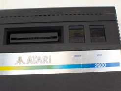 Atari 2600 console with Space Invaders cartridge, a nostalgic classic for retro gaming enthusiasts.