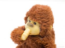 Cute vintage plush monkey toy for kids and collectors, perfect for imaginative play.