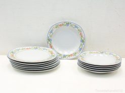 Charming ceramic plates with vibrant floral designs for elegant dining and special occasions.