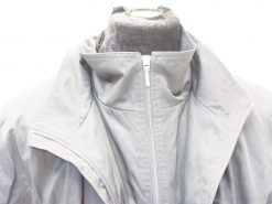 Stylish gray womens jacket with high collar and zipper for casual outdoor activities.