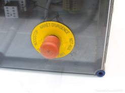 Multilingual emergency stop button enhances safety with bright design for quick identification in emergencies.