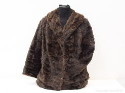 Luxurious oversized brown faux fur coat for women, combining elegance, warmth, and style.