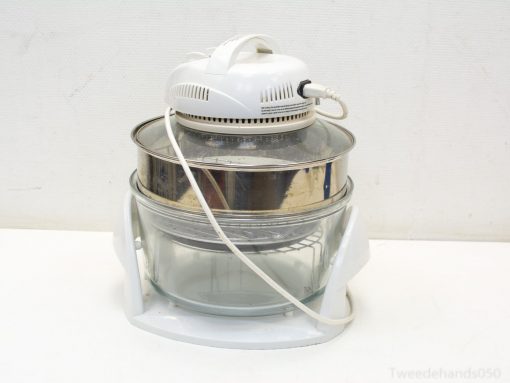 Modern halogen oven with transparent glass bowl for healthy cooking and easy meal visibility.