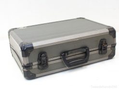 Durable gray case with ergonomic handle, perfect for business travel and equipment storage.