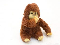 Charming plush Sasquatch figure with big eyes, perfect for imaginative play and collecting.