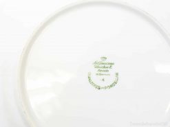 Meissen porcelain dish with green mark, a timeless collectible for elegant dining experiences.